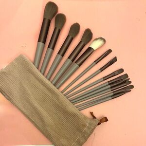 New in pouch - Brown drawstring make up brush pouch with 13 makeup brushes.